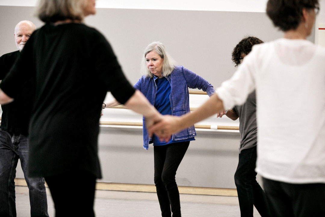 The steady beat found in music acts as a timing cue to improve walking. © Chris Hardy